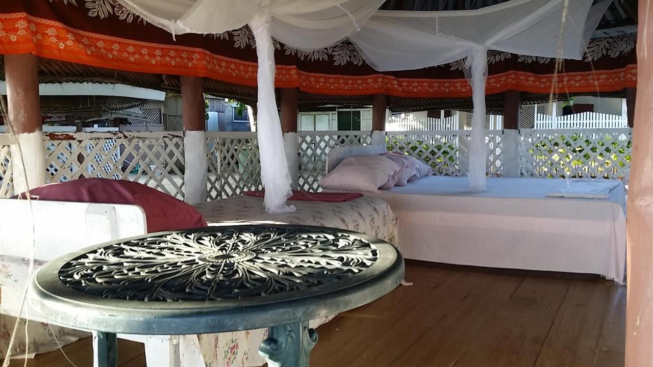 Отель Vacation Beach Fales Manase Экстерьер фото